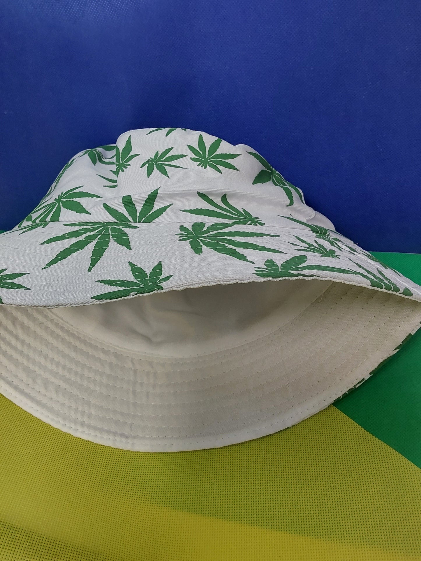 White/ green leaf reversible marijuana leaf bucket hat