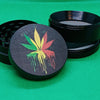 4 pc dripping rasta pot leaf grinder 2"